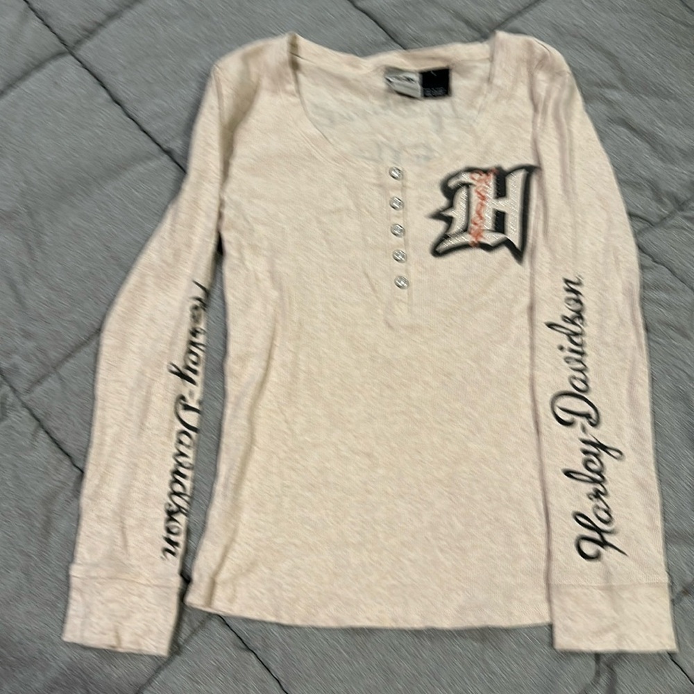Harley Davidson. Like New. Cream with black and orange writing. Long sleeve.